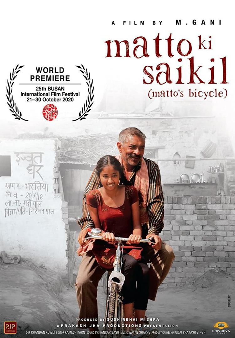 Matto Ki Saikil (Matto's Bicycle) movie poster showing man riding on bike with a woman